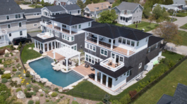 York, Maine oceanfront double mansion by Don Madore custom home design and construction. Saltwater pool.