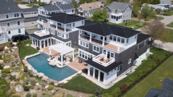 York, Maine oceanfront double mansion by Don Madore custom home design and construction. Saltwater pool.